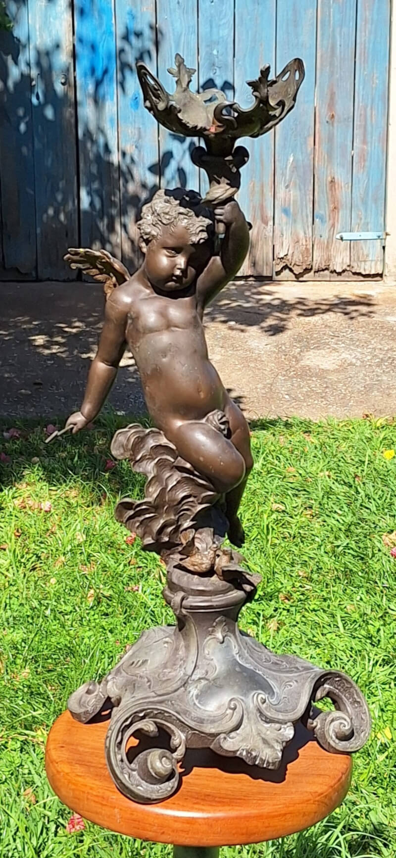 estatua de cupido em estanho 1930 vista frontal